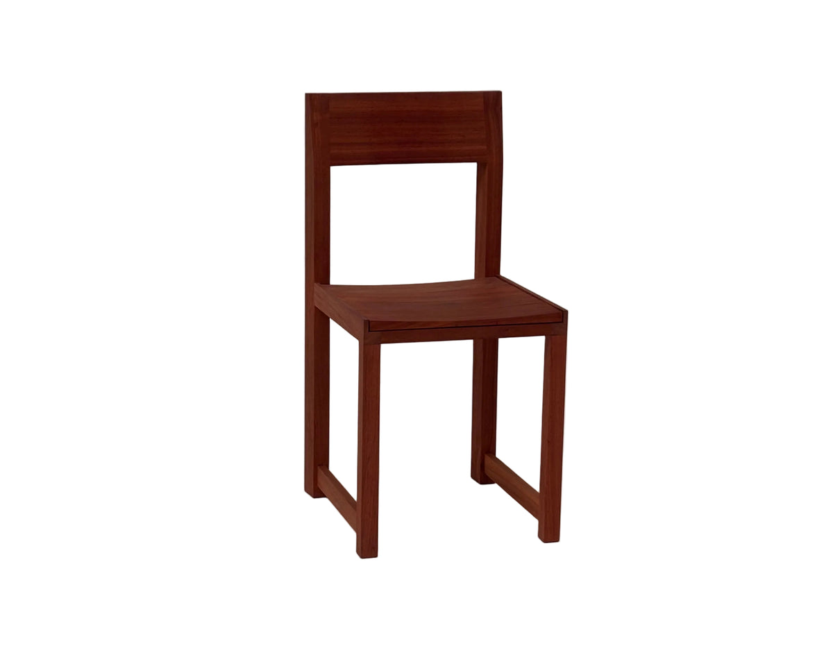 Trapezium Chair in padauk, front three-quarter view