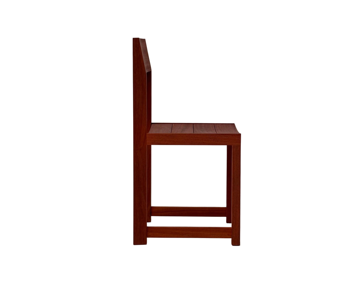 Trapezium Chair in padauk, opposite side view