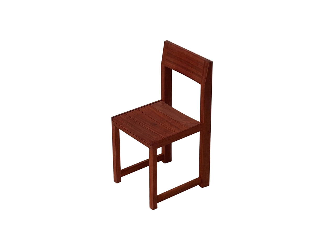 Trapezium Chair in padauk, rear three-quarter view